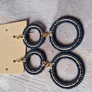 Gold tone navy bead earrings